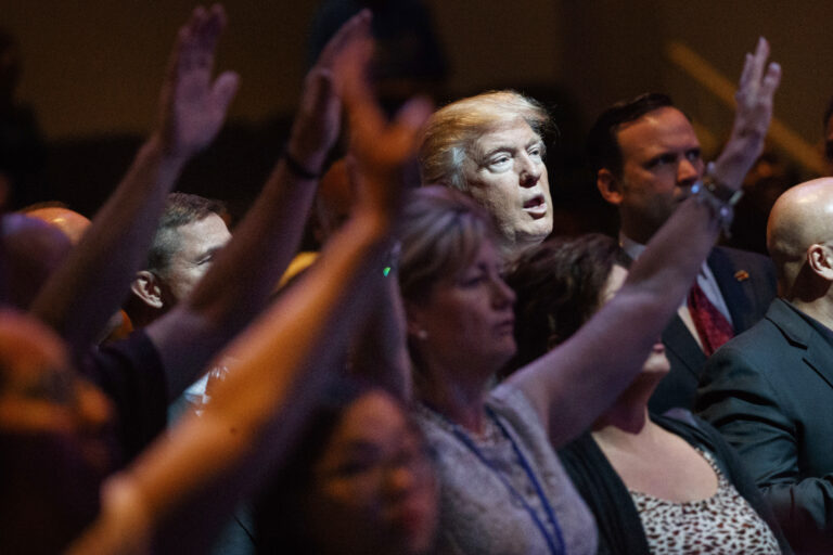 FILE- In this Oct. 30, 2016, file photo, Republican presidential candidate Donald Trump stands during a service at the International Church of Las Vegas in Las Vegas. President Trump’s pledge to scrap limits on church political activity could have sweeping effects that extend beyond his conservative supporters to more liberal congregations, including the black evangelical church that has long helped anchor the Democratic Party’s electoral machinery. (AP Photo/Evan Vucci, File) (AP)