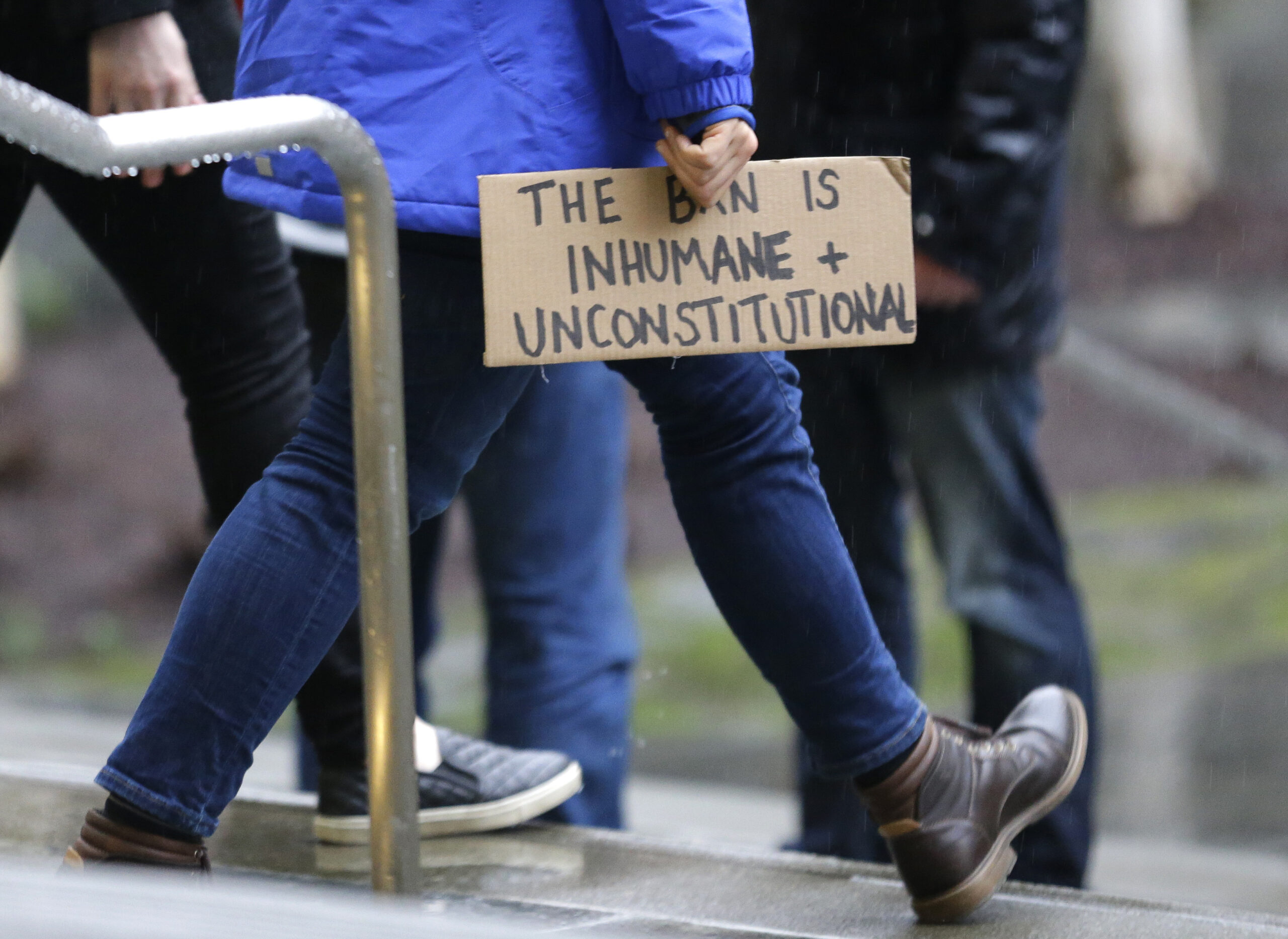 A person walks away from the federal courthouse in Seattle (AP)
