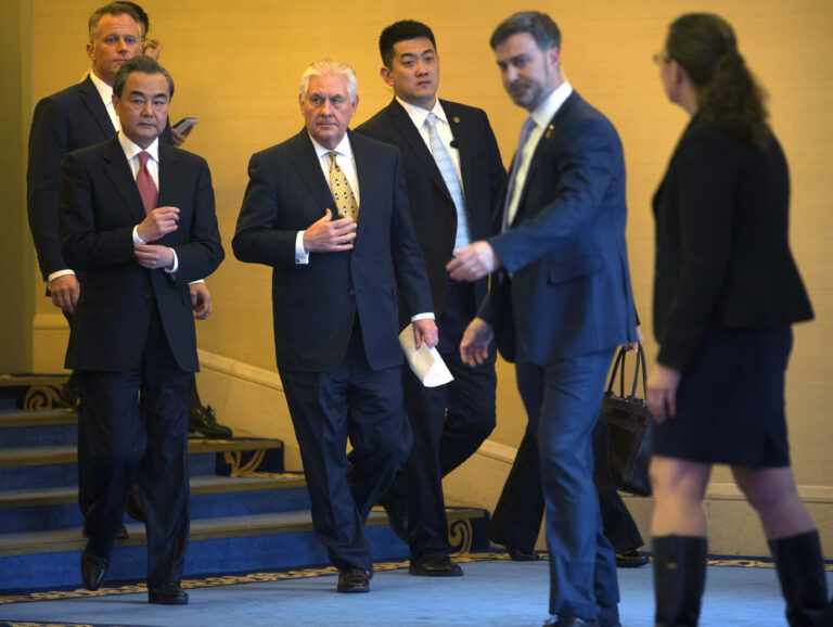 U.S. Secretary of State Rex Tillerson, second left, and Chinese Foreign Minister Wang Yi, left, Beijing, China (AP Photo/Mark Schiefelbein, Pool)