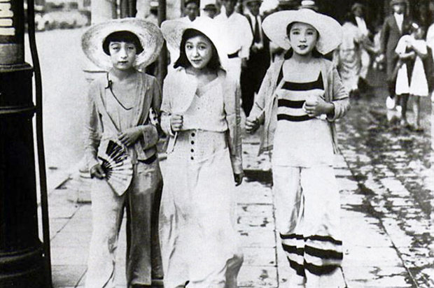 Young moga (modern girls) walk down a Ginza street in 1928 dressed in 'Beach Pyjama Style.' (Wikicommons)