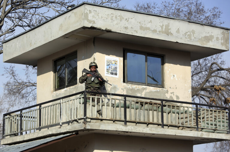 An Afghan soldier stands guard at a military hospital after an attack in Kabul, Afghanistan, Wednesday, March 8, 2017. (AP Photo/Rahmat Gul) (AP)