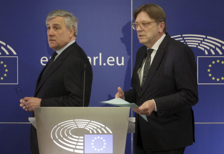 European Parliament President Antonio Tajani, left, and leader of the ALDE party Guy Verhofstadt prepare to address a media conference at the European Parliament in Brussels on Wednesday, March 29, 2017. (AP Photo/Olivier Matthys) (AP)