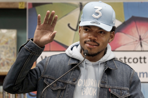 Chance The Rapper announces a gift of $1 million to the Chicago Public School Foundation during a news conference at the Westcott Elementary School, March 6, 2017, in Chicago. (AP/Charles Rex Arbogast)