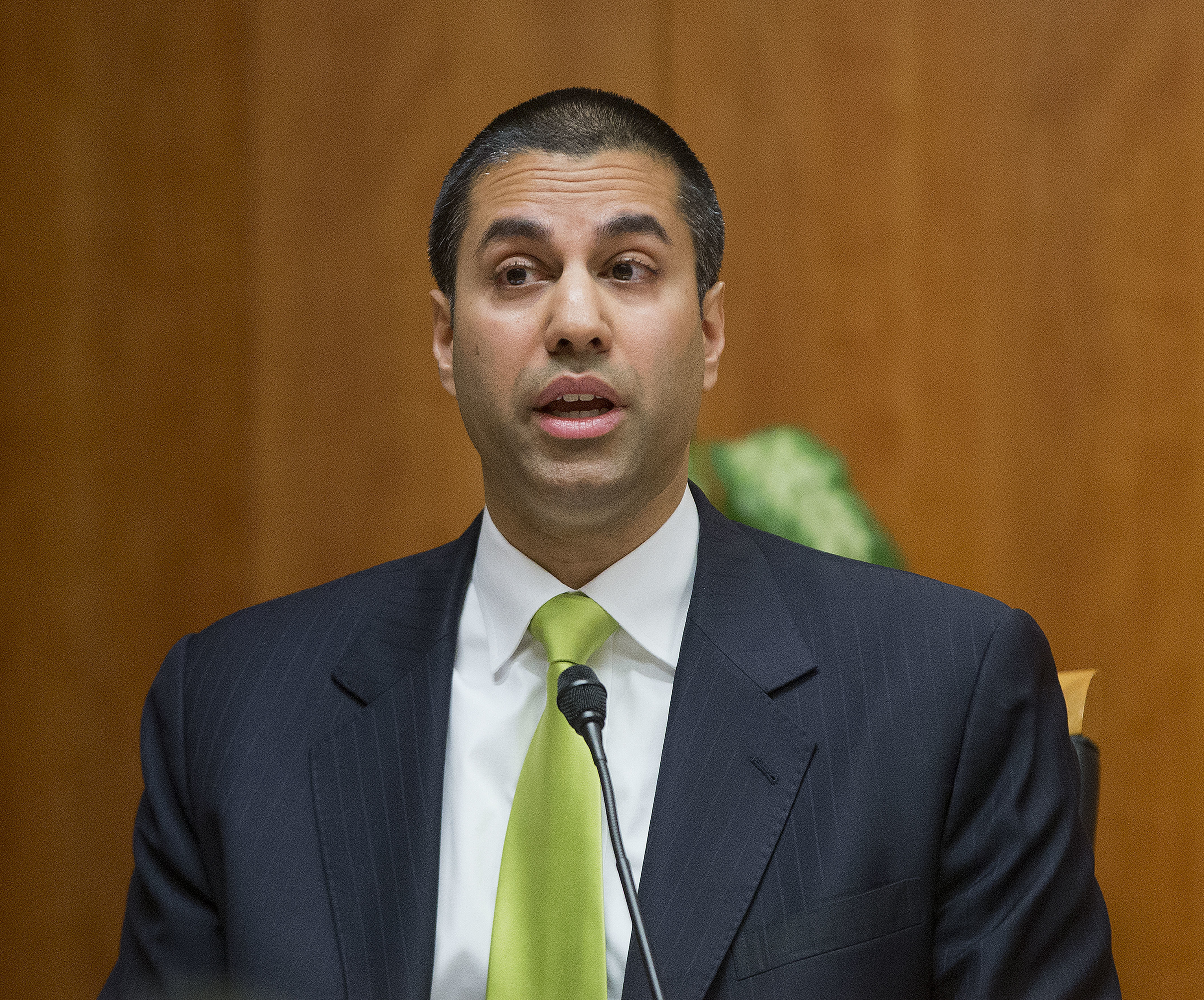 FILE - In this Thursday, Feb. 26, 2015, file photo, Federal Communication Commission Commissioner Ajit Pai speaks during an open hearing and vote on "Net Neutrality" in Washington. (AP Photo/Pablo Martinez Monsivais, File)