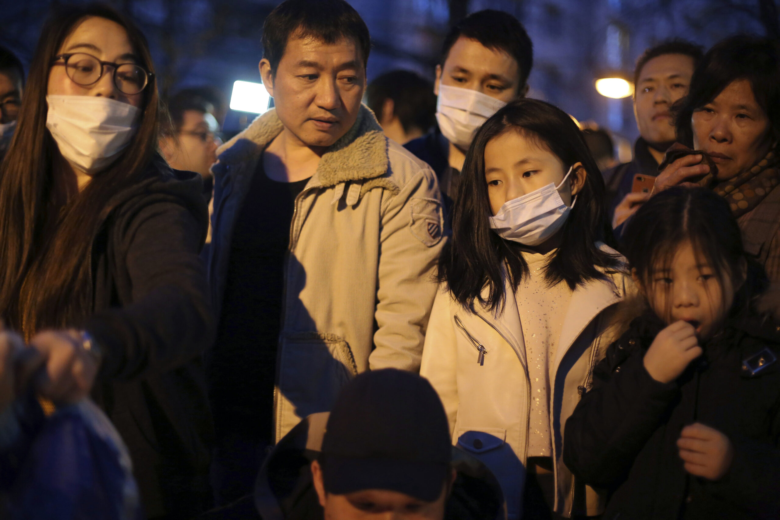 Chinese immigrants gather to protest over the fatal shooting of a Chinese man in his apartment, in Paris, Tuesday, March 28, 2017. Chinese immigrants and China's government are protesting a police killing in Paris that prompted violent street clashes and exposed the fears and frustrations of France's large Asian community. (AP Photo/Thibault Camus) (AP)