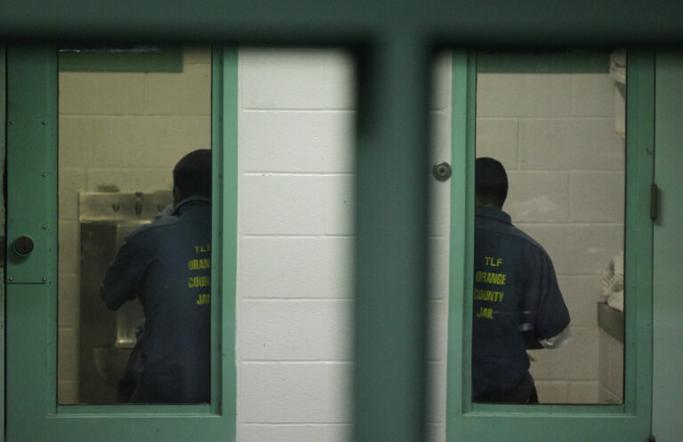 FILE--In this Sept. 28, 2010, file photo, immigration detainees sit in their cells at the Theo Lacy Facility in Orange, Calif. The Department of Homeland Security's Inspector General on Wednesday, Mar. 8, 2017, reported health risks and safety concerns at the Theo Lacy Facility. (AP Photo/Jae C. Hong, file) (AP)