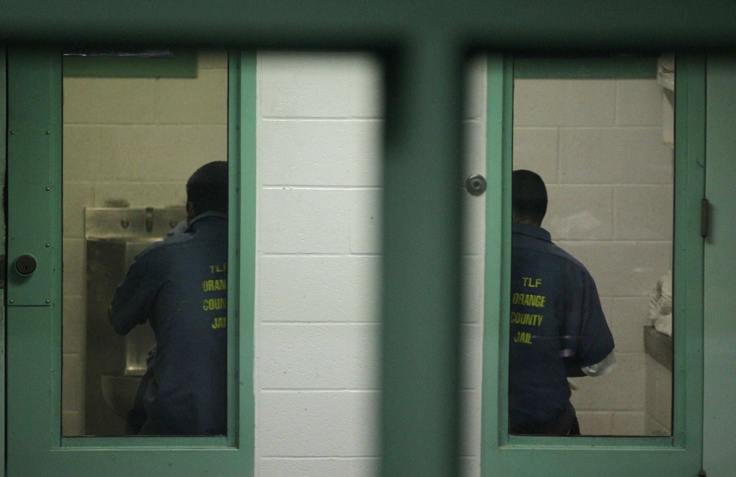 FILE--In this Sept. 28, 2010, file photo, immigration detainees sit in their cells at the Theo Lacy Facility in Orange, Calif. The Department of Homeland Security's Inspector General on Wednesday, Mar. 8, 2017, reported health risks and safety concerns at the Theo Lacy Facility. (AP Photo/Jae C. Hong, file) (AP)