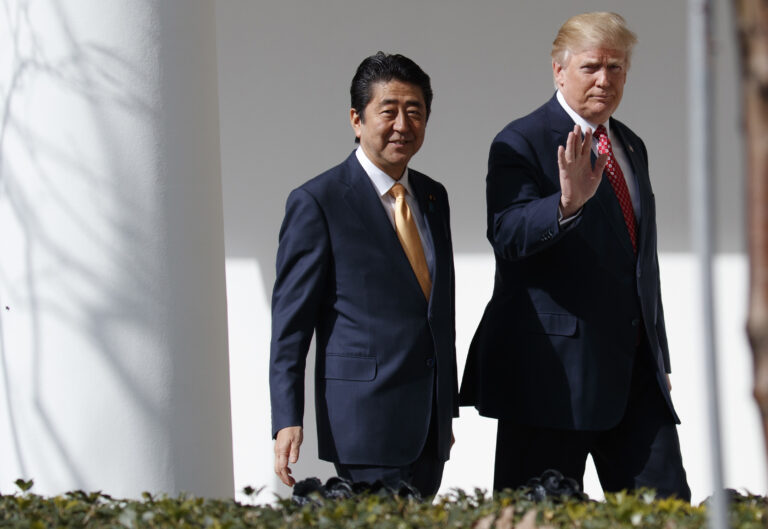 FILE - In this Feb. 10, 2017, file photo, Japanese Prime Minister Shinzo Abe, left, and U.S. President Donald Trump walk together to a news conference at the White House in Washington. (AP Photo/Evan Vucci, File)