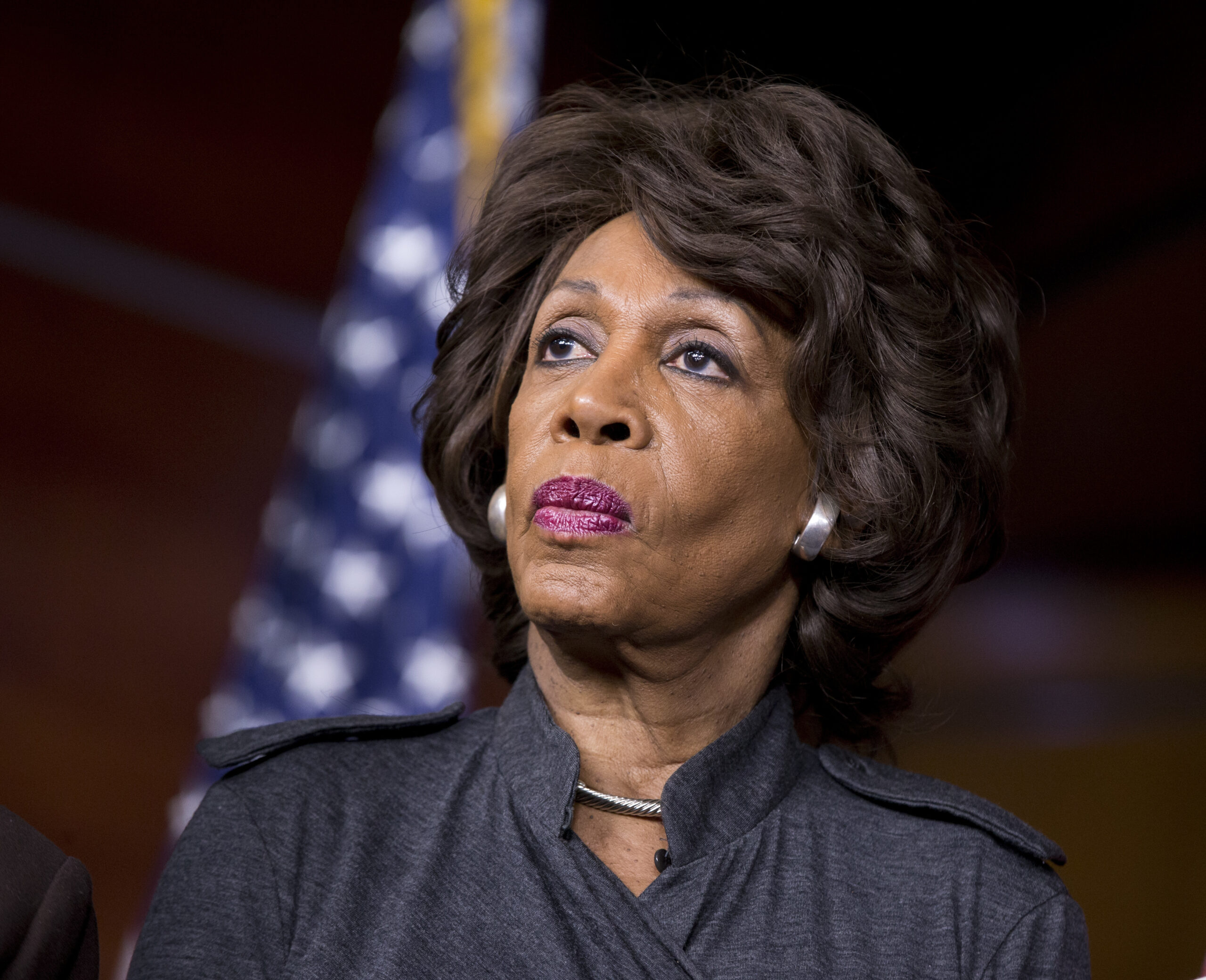 FILE - In this Feb. 28, 2013 file photo, Rep. Maxine Waters, D-Calif., listens during a news conference on Capitol in Washington. Waters has served in Congress for a quarter-century. Now she’s turned into the passionate voice of resistance against the Trump administration. (AP Photo/J. Scott Applewhite, File) (AP)