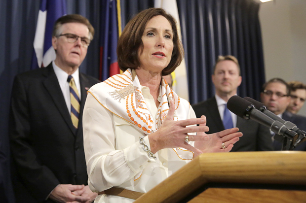 Lois Kolkhorst, backed by Dan Patrick and other legislators, talks to the media during a news conference to discuss Senate Bill 6 at the Texas Capitol, Monday, March 6, 2017, in Austin, Texas. (AP/Eric Gay)