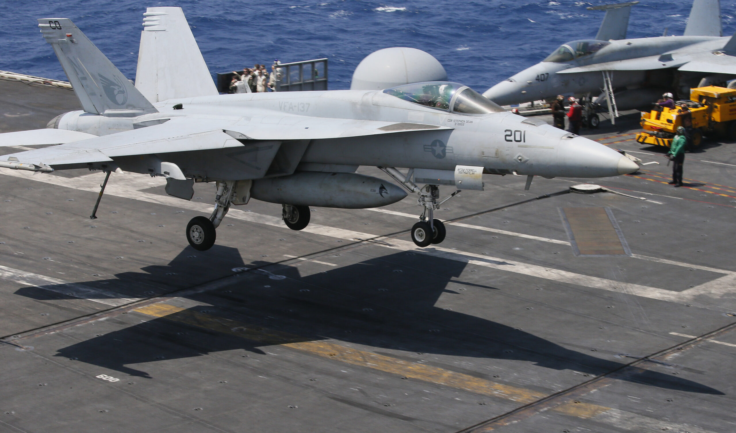 A U.S. Navy F18 fighter jet lands on the U.S. Navy aircraft carrier USS Carl Vinson (CVN 70) following a routine patrol off the disputed South China Sea Friday, March 3, 2017. (AP Photo/Bullit Marquez) (AP)