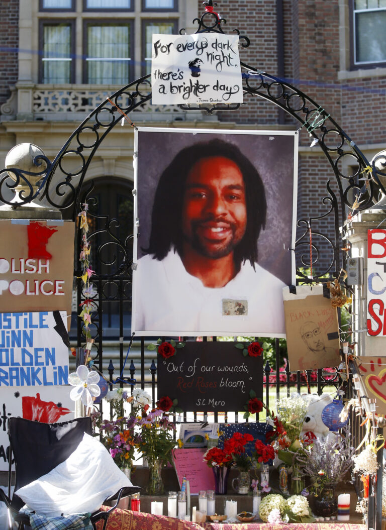 FILE - In this July 25, 2016, file photo, a memorial including a photo of Philando Castile adorns the gate to the governor's residence where protesters continue to demonstrate in St. Paul, Minn., against the July 6, 2016, shooting death of Castile by St. Anthony police Officer Jeronimo Yanez during a traffic stop in Falcon Heights, Minn. Yanez is expected to enter his plea on manslaughter charges during a hearing Monday, Feb. 27, 2017. (AP Photo/Jim Mone, File) (AP)