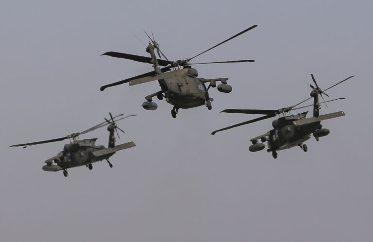 US Army 2nd Battalion, 10th Regiment, 10th Brigade UH-60 Blackhawk helicopters take off during a joint US-Romanian air assault exercise at the Mihail Kogalniceanu airbase, eastern Romania, Wednesday, March 8, 2017.  (AP Photo/Vadim Ghirda) (AP)
