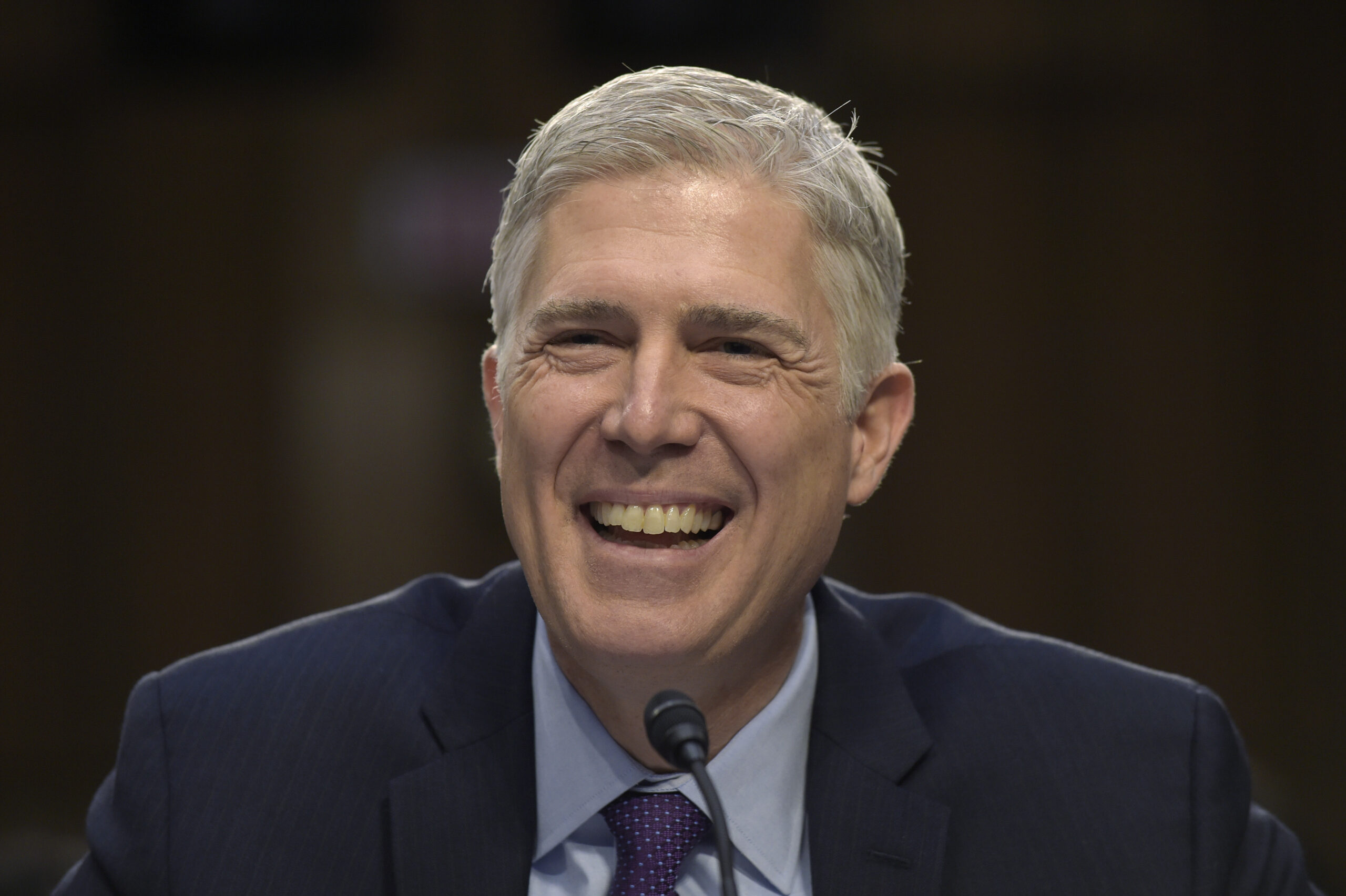 Supreme Court Justice nominee Neil Gorsuch smiles as he testifies on Capitol Hill in Washington, Tuesday, March 21, 2017, during his confirmation hearing before the Senate Judiciary Committee. (AP Photo/Susan Walsh) (AP Photo/Susan Walsh)