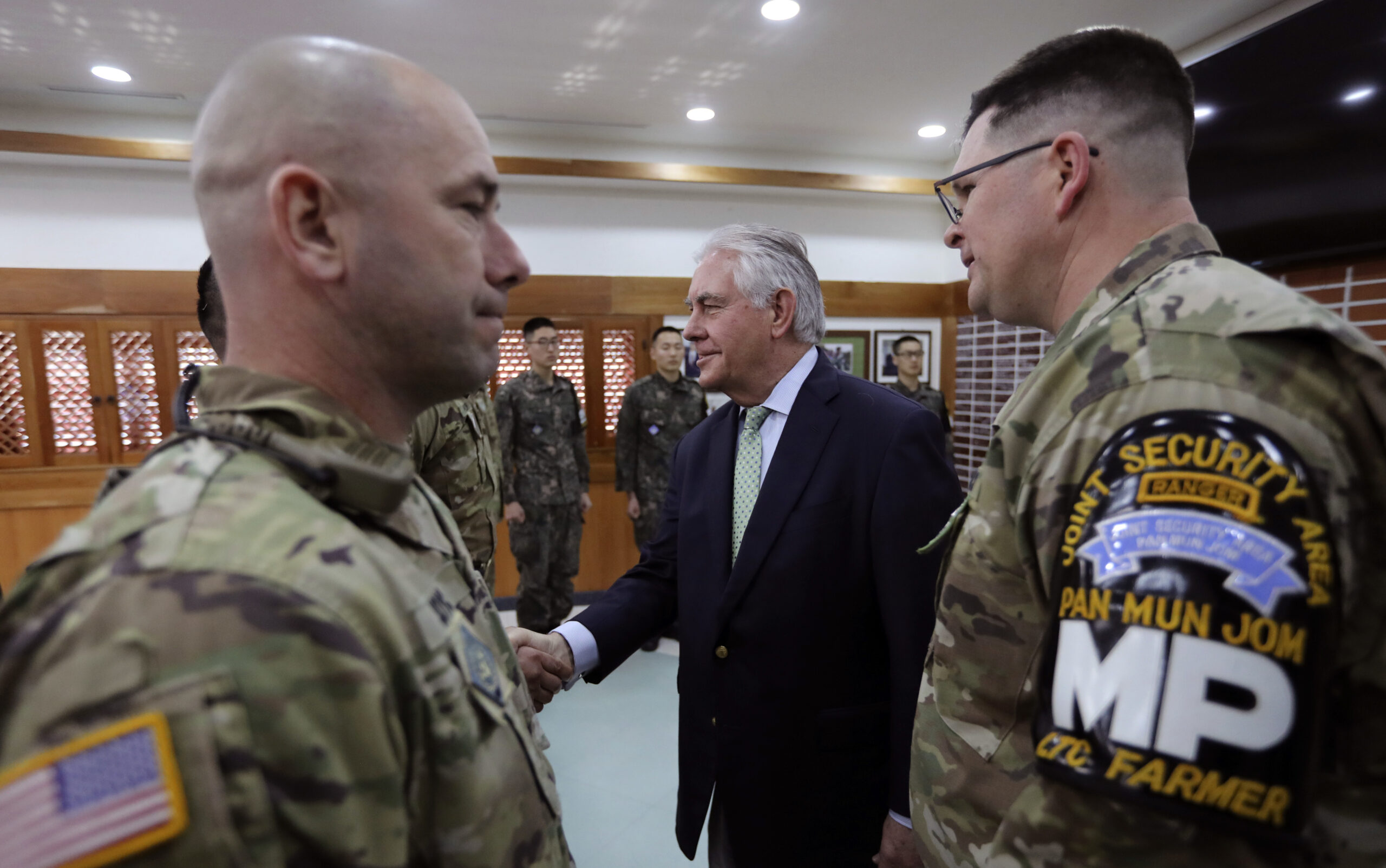 Secretary of State Rex Tillerson meets with U.S. and South Korea soldiers before lunch meeting near village of Panmunjom (AP Photo/Lee Jin-man)
