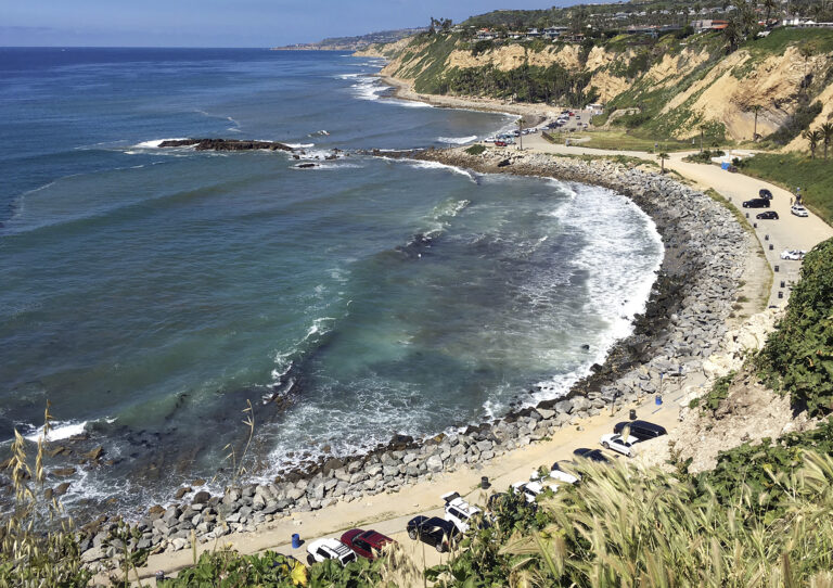 In this Sunday, March 26, 2017, photo, Royal Palms Beach in the San Pedro area of Los Angeles is protected by boulders placed there to forestall erosion. A new study predicts that with limited human intervention, 31 percent to 67 percent of Southern California beaches could completely erode back to coastal infrastructure or sea cliffs by the year 2100, with sea-level rises of 3.3 feet (1 meter) to 6.5 feet (2 meters). The study released Monday, March 27, 2017, used a new computer model to predict shoreline effects caused by sea level rise and changes in storm patterns due to climate change. (AP Photo/John Antczak) (AP)
