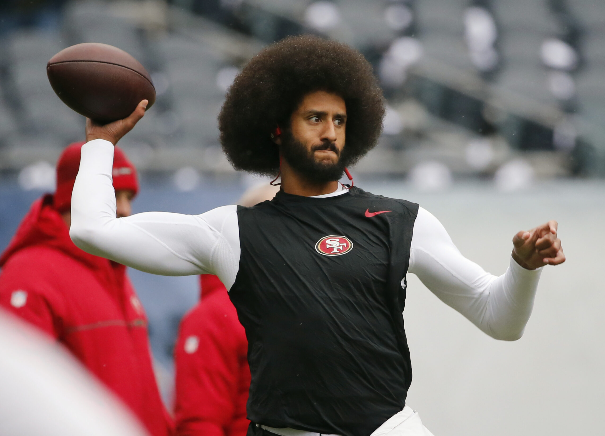 FILE - In this Dec. 4, 2016, file photo, San Francisco 49ers quarterback Colin Kaepernick warms up before an NFL football game against the Chicago Bears. Spike Lee said on Instagram Sunday, March 19, 2017, that it was "fishy" that Kaepernick, now a free agent, hadn't been signed." (AP Photo/Charles Rex Arbogast, File) (AP)