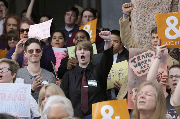 Members of the transgender community take part in a rally on the steps of the Texas Capitol, Monday, March 6, 2017, in Austin, Texas. (AP/Eric Gay)