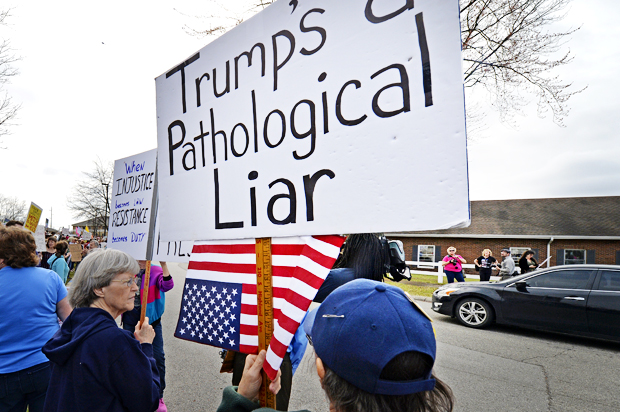 A group numbering in the hundreds gathered to protest the appearance of Mitch McConnell (AP/Timothy D. Easley)