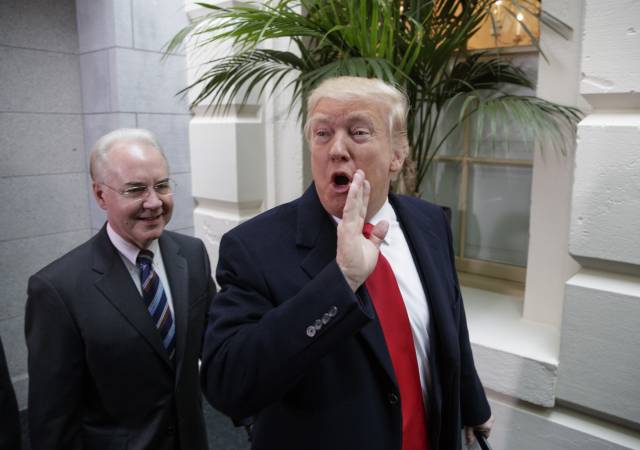 President Donald Trump and Health and Human Services Secretary Tom Price arrive on Capitol Hill (AP Photo/J. Scott Applewhite)