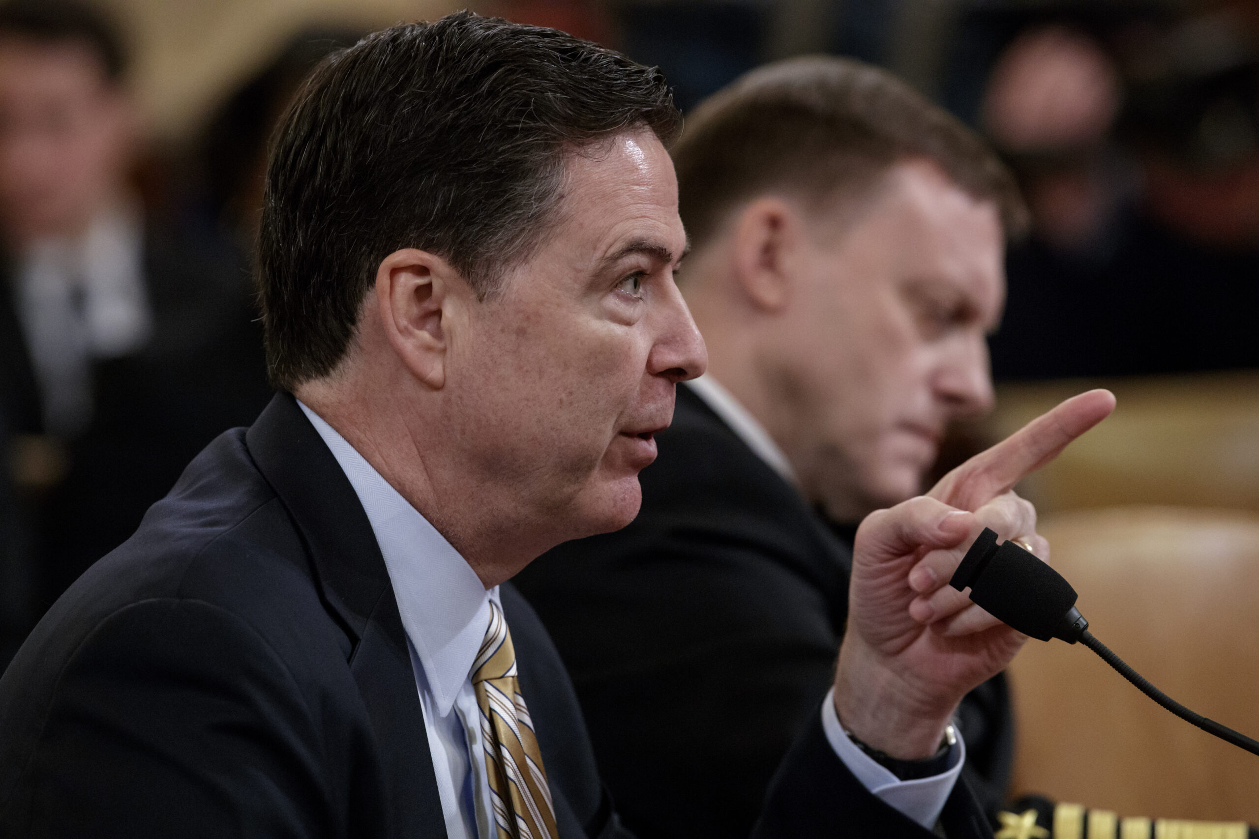 FBI Director James Comey, left, and National Security Agency Director Michael Rogers, testify on Capitol Hill in Washington, Monday, March 20, 2017, before the House Intelligence Committee hearing on allegations of Russian interference in the 2016 U.S. presidential election. (AP Photo/J. Scott Applewhite) (AP)