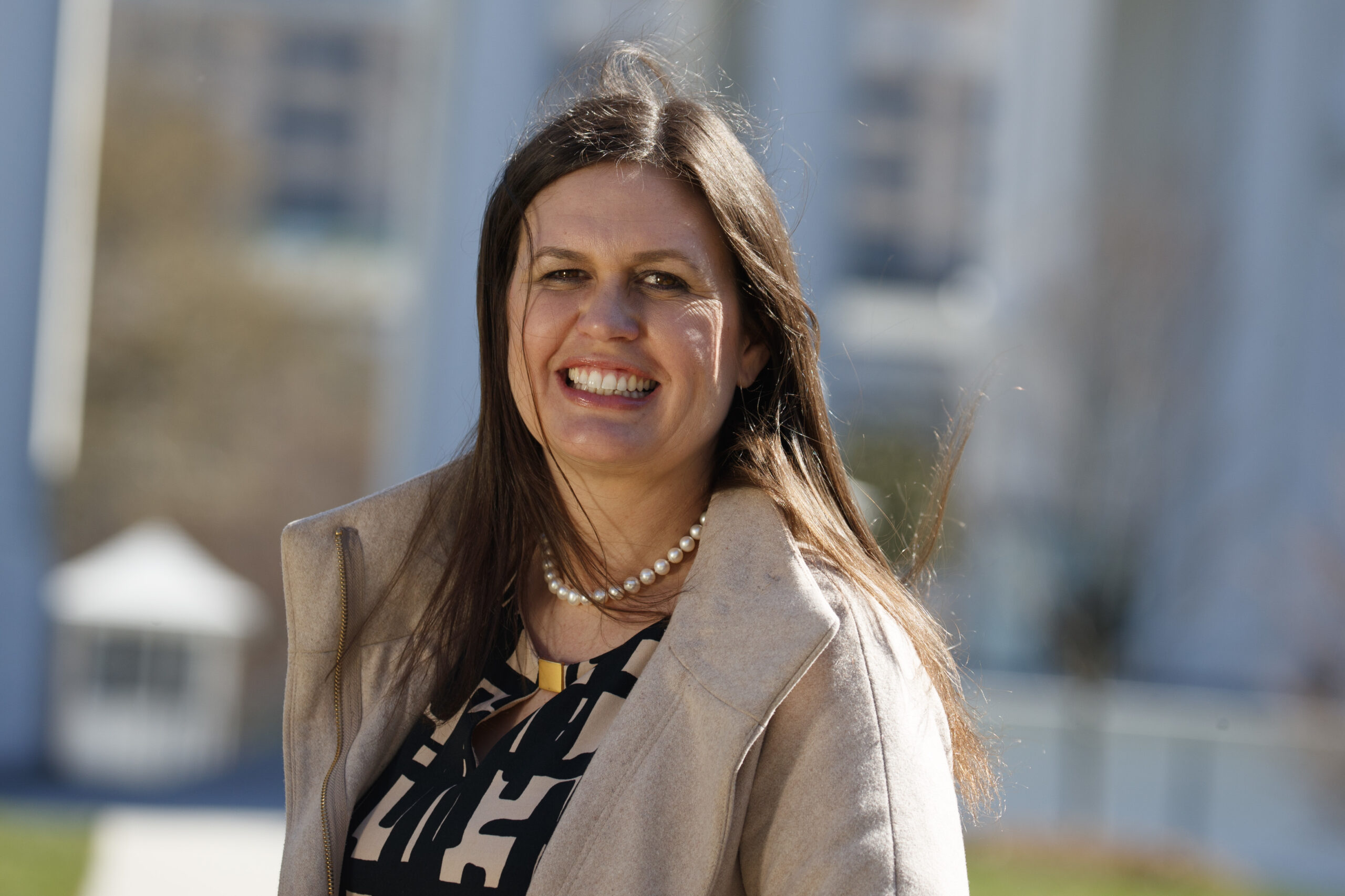 In this March 8, 2017, photo, White House deputy press secretary Sarah Huckabee Sanders stands in front of the White House in Washington. Faced with aggressive on-air questioning about the president’s wiretapping claims, Sarah Huckabee Sanders didn’t flinch, she went folksy. The 34-year-old spokeswoman for President Donald Trump was schooled in hardscrabble politics, and down-home rhetoric, from a young age by her father, folksy former Arkansas Gov. Mike Huckabee. (AP Photo/Evan Vucci) (AP)