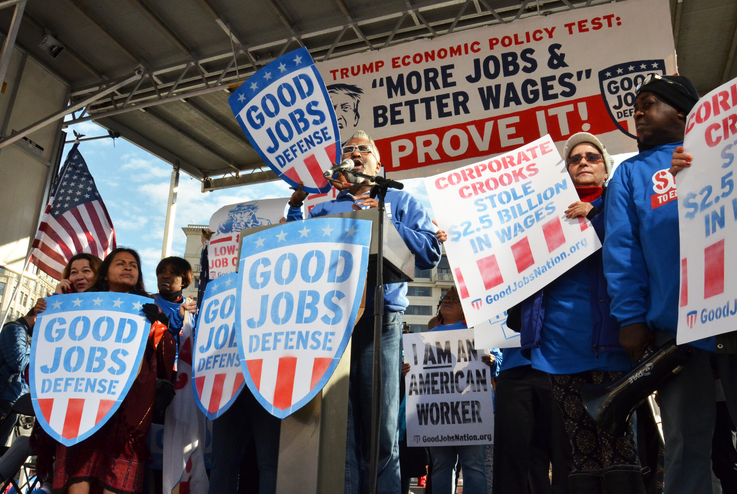 Employees of federal contractors and their advocates rallied on Dec. 7, 2016, at Freedom Plaza in Washington, D.C. They called on President-elect Trump to act on his promise to uplift workers. (Talia Buford/Center for Public Integrity)