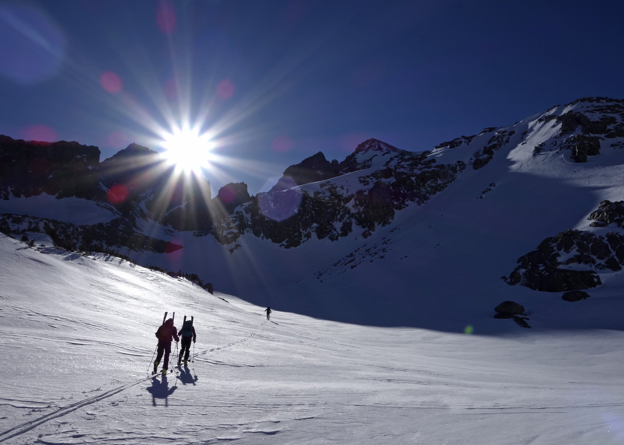 In this photo taken April 1, 2017, members of a California Cooperative Snow Survey team ski toward Bishop Pass in Inyo National Forest near Bishop, Calif. Despite new technologies, California's snowpack is still measured the old-fashioned way: by skiers who manually measure the depth and water content of the snowpack. The practice remains an important way to verify and fine-tune remotely collected data. (AP Photo/Brian Melley) (AP)