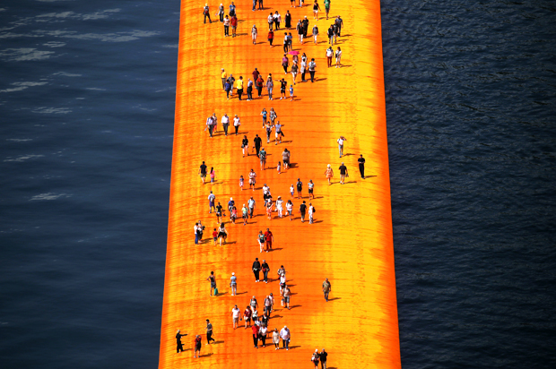 'The Floating Piers' created by artist Christo Vladimirov Javacheff on Iseo Lake, in northern Italy (Getty/Marco Bertorello)