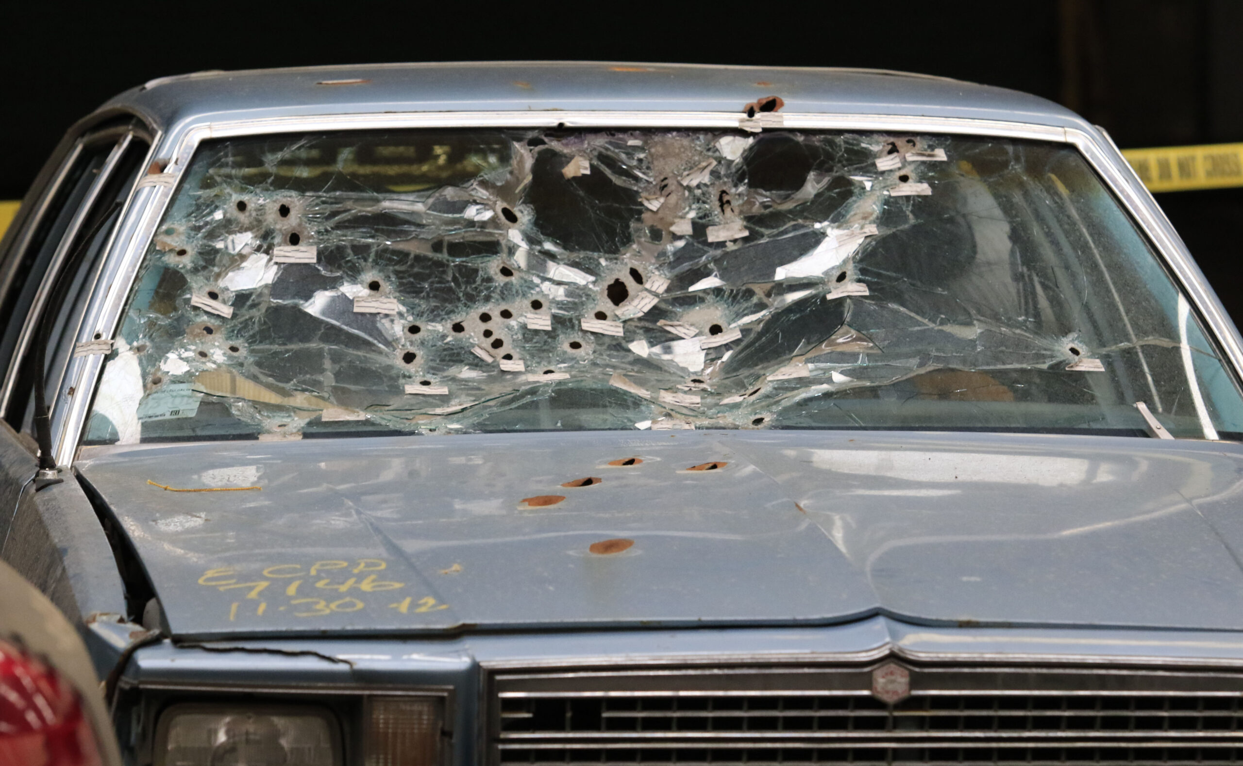 FILE – This April 10, 2015, file photo shows the car driven by Timothy Russell, killed along with Malissa Williams in a 137-shot barrage of police gunfire on Nov. 29, 2012, in Cleveland. The Ohio Supreme Court ruled unanimously Thursday, April 13, 2017, that a judge in Cleveland, where two unarmed blacks died in a 137-shot barrage of police gunfire on Nov. 29, 2012, can hear dereliction of duty charges against five police supervisors accused of failing to control a high-speed chase involving more than 100 officers. (AP Photo/Aaron Josefczyk, Pool, File) (AP)