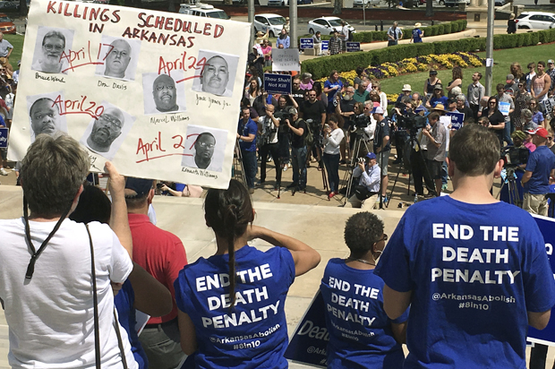 Protesters gather outside the state Capitol building on April 14, 2017, in Little Rock, Ark. (AP/Kelly P. Kissel)