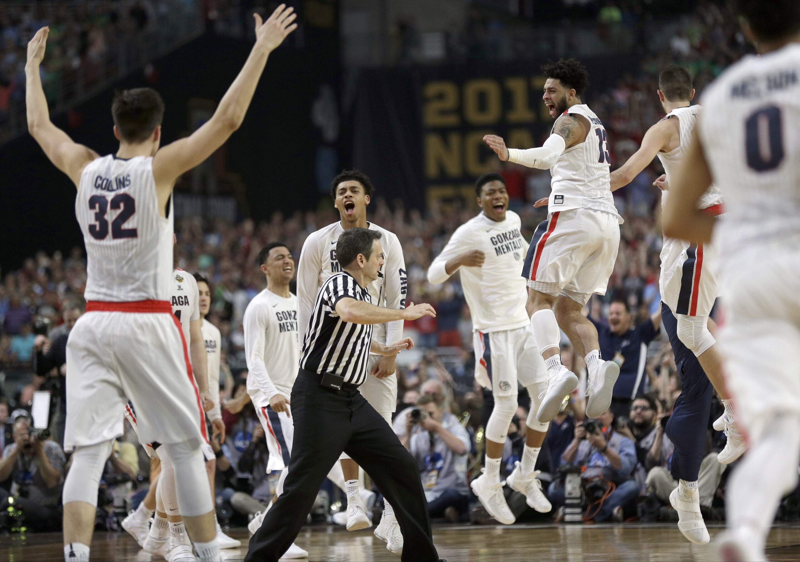 Gonzaga players celebrate after the semifinals of the Final Four NCAA college basketball tournament (AP)