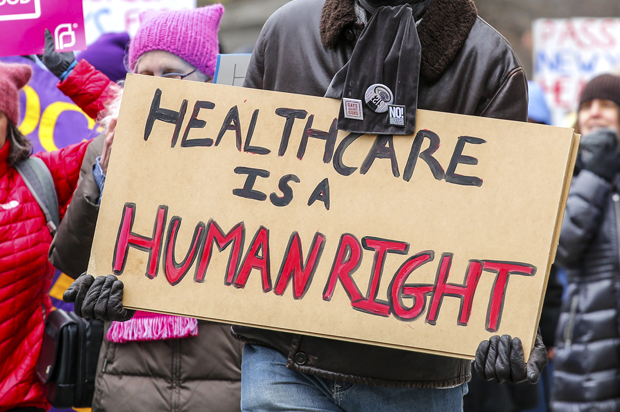 Activists protest during the "March for Health" demanding equitable and affordable access to quality healthcare, on April 01, 2017, in New York.  / AFP PHOTO / KENA BETANCUR        (Photo credit should read KENA BETANCUR/AFP/Getty Images) (Getty/Kena Betancur)