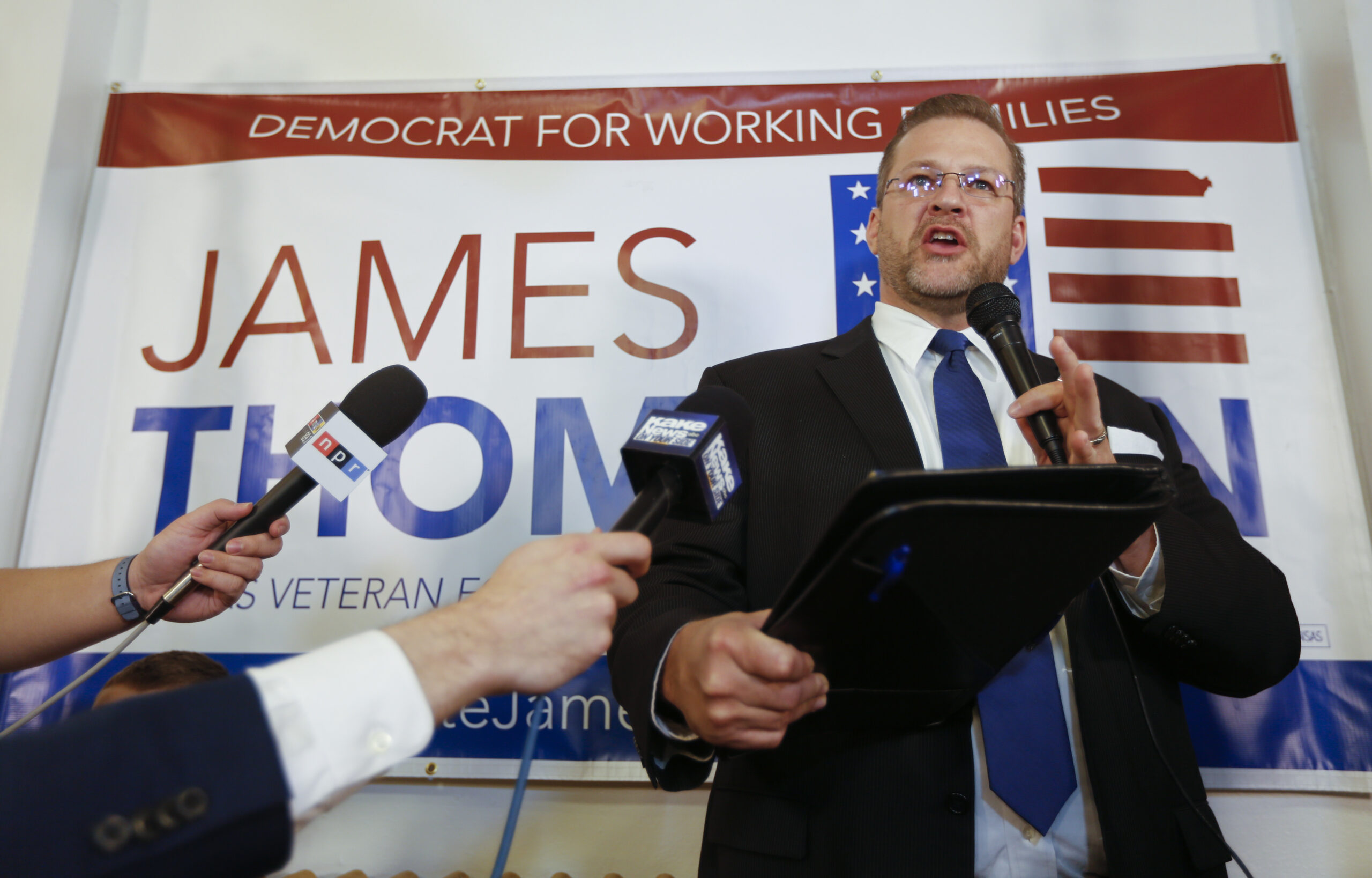 Democrat James Thompson speaks to supporters at the Murdock Theatre in Wichita, Kan., Tuesday, April, 11, 2017. (Travis Heying/The Wichita Eagle via AP)