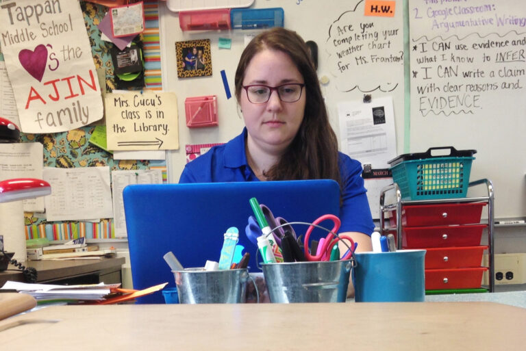 In this Monday, April 3, 2017, photo, Samantha Cucu types on a laptop inside her classroom at Tappan Middle School in Ann Arbor, Mich. (AP Photo/Mike Householder) (AP)