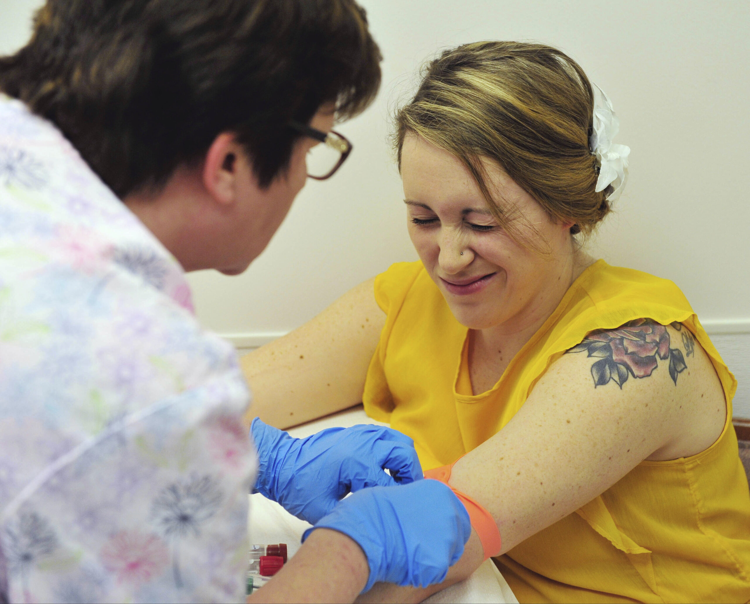 Nurse Kim Gates draws blood from Heidi Wyandt, 27, at the Altoona Center for Clinical Research in Altoona, Pa., on Wednesday, March 29, 2017, where Wyandt is helping test an experimental non-opioid pain medication for chronic back pain related to a work related injury she received in 2014. With about 2 million Americans hooked on opioid painkillers, researchers and drug companies are searching for less addictive drugs to treat pain. (AP Photo/Chris Post) (AP)