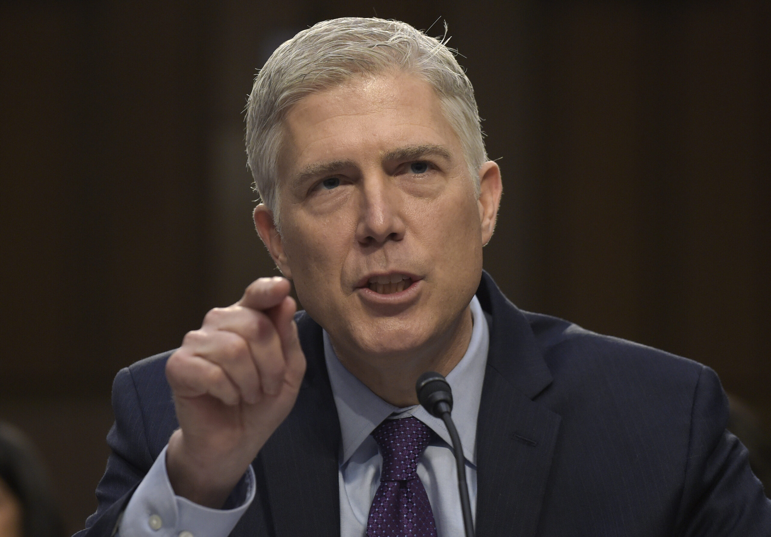 FILE - In this March 21, 2017 file photo, Supreme Court Justice nominee Neil Gorsuch testifies on Capitol Hill in Washington during his confirmation hearing before the Senate Judiciary Committee. A divided Senate Judiciary Committee backed Gorsuch, Monday, April 3, 2017. (AP Photo/Susan Walsh, File)