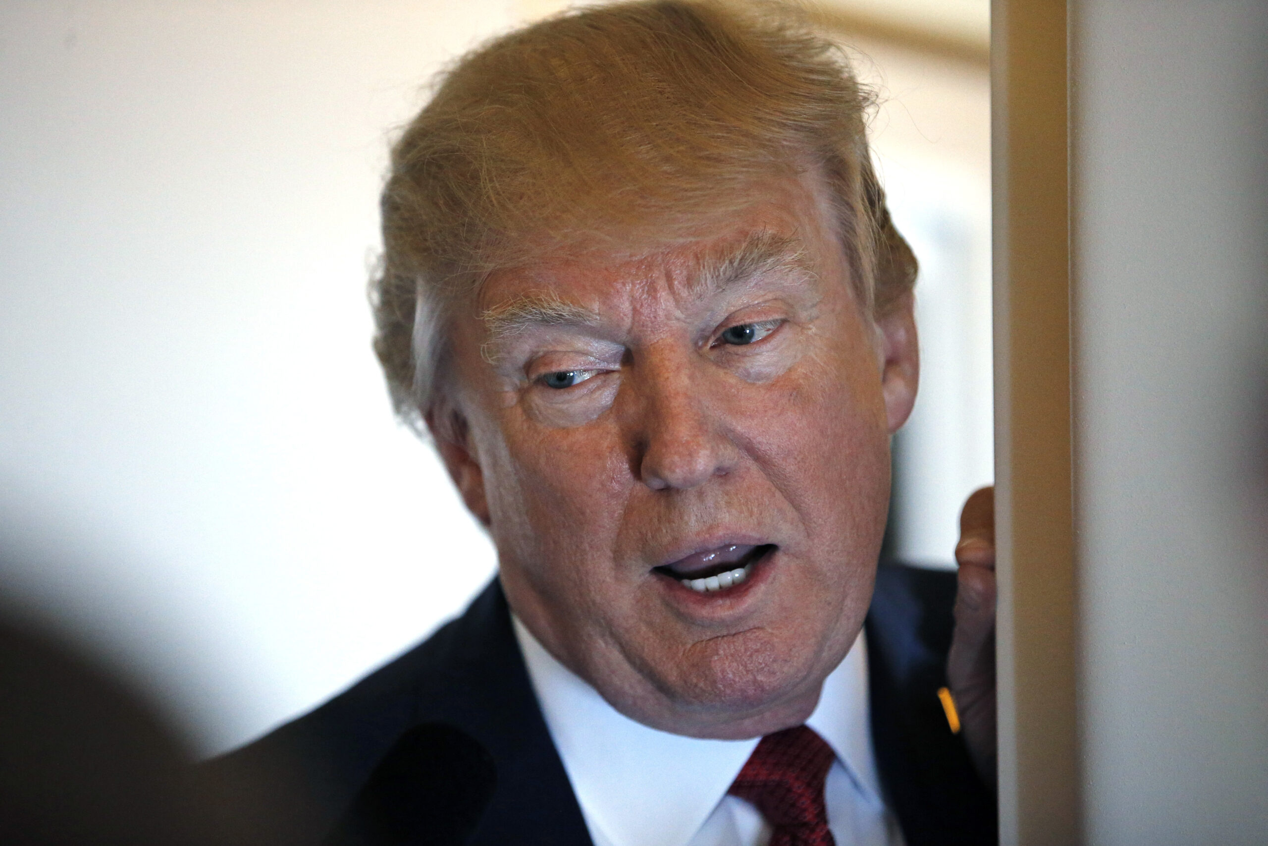 President Donald Trump speaks with reporters on Air Force One while in flight from Andrews Air Force Base, Md., to Palm Beach International Airport, Fla., Thursday, April 6, 2017. (AP Photo/Alex Brandon) (AP)