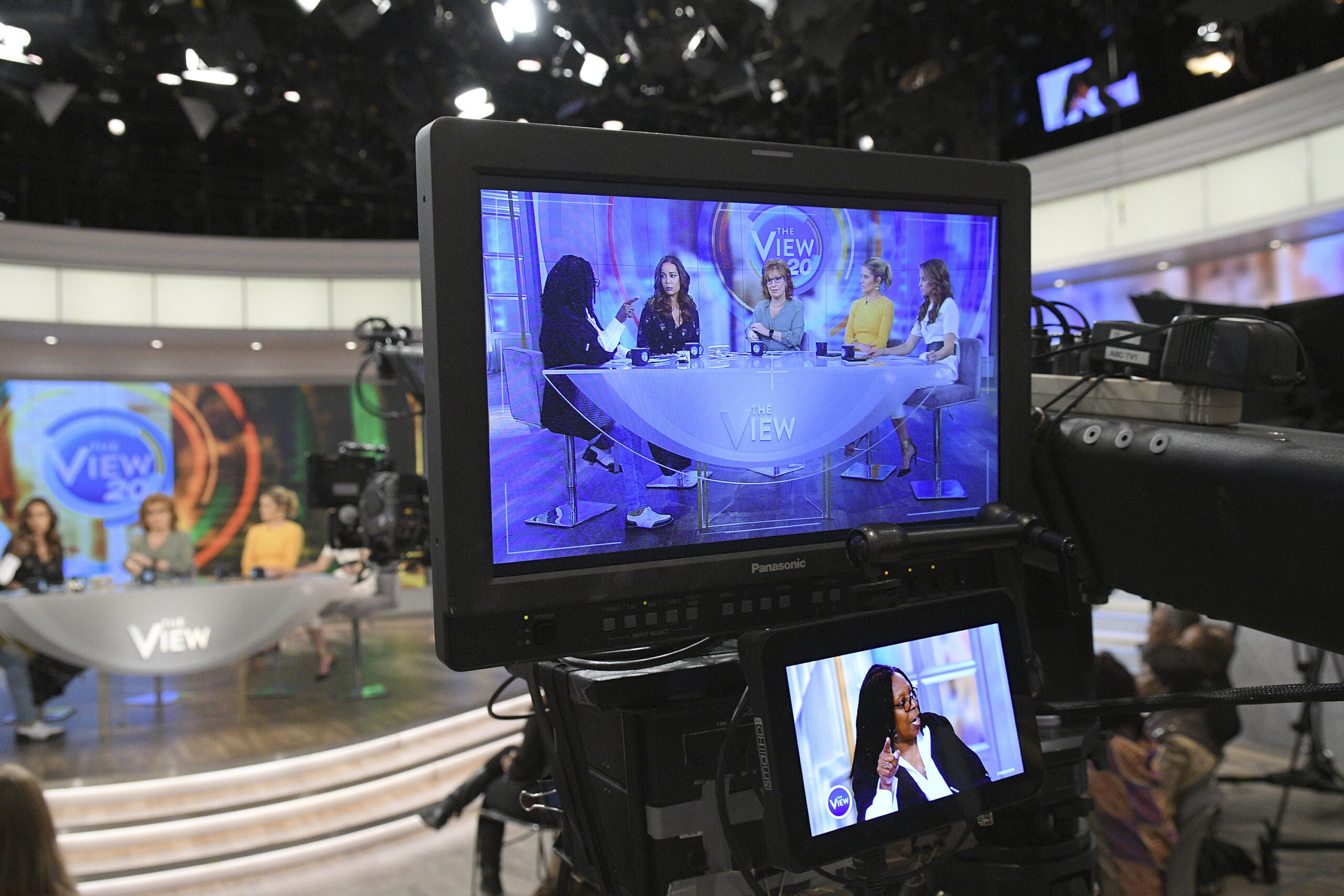 In this March 21, 2017 photo released by ABC, co-hosts, from left, Whoopi Goldberg, Sunny Hostin, Joy Behar, Sara Haines and Jedediah Bila appear on a monitor during a broadcast of "The View," in New York. The unquenchable thirst for chatter about President Donald Trump has changed the dynamics of a fierce daytime television competition much as it has in late-night TV. "The View" has spent more time talking politics with the arrival of a new administration, stopping the momentum of its rival "The Talk," which sticks to pop culture. (Lorenzo Bevilaqua/ABC via AP) (AP)