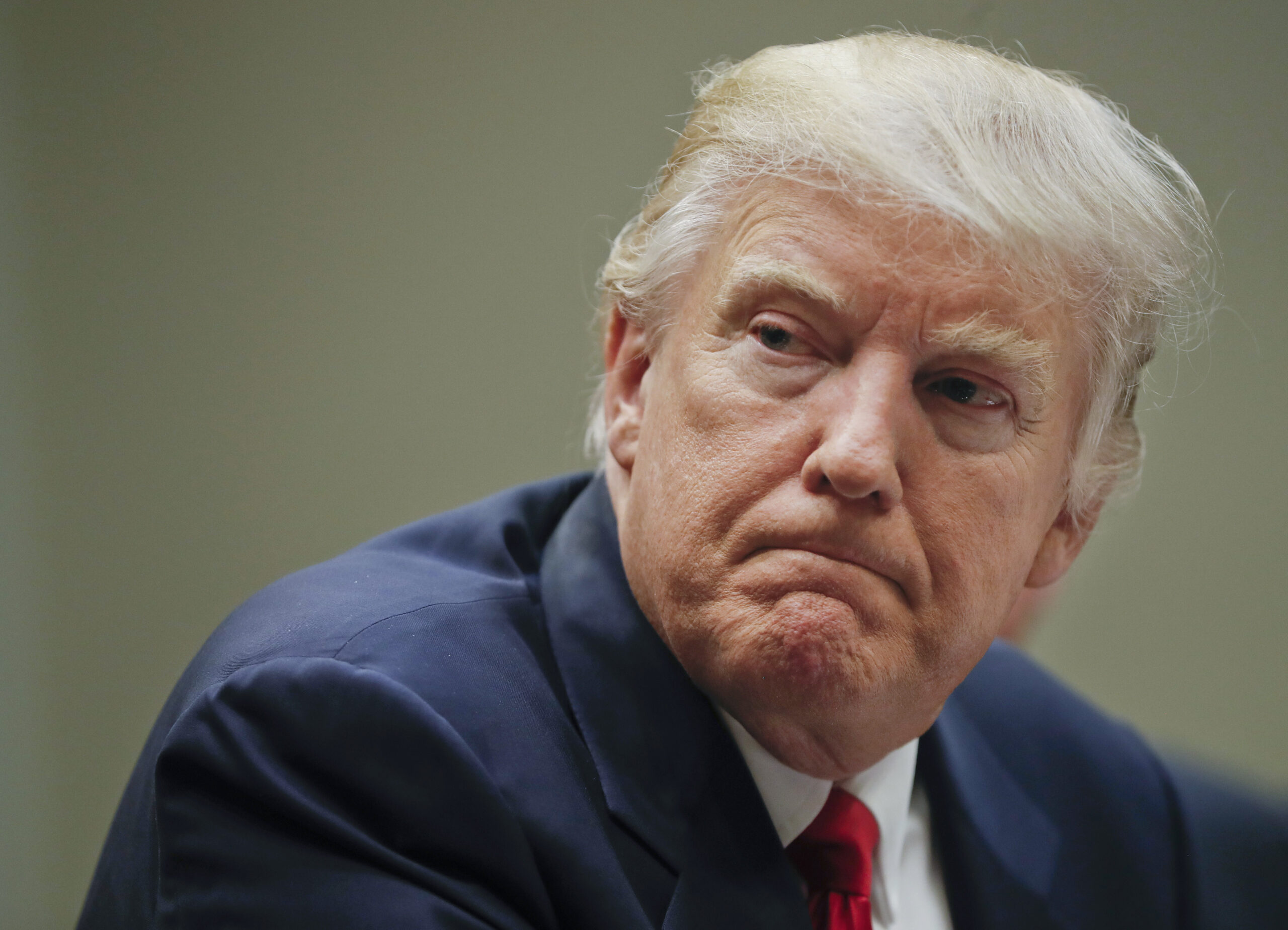 FILE - In this Monday, Feb. 27, 2017, file photo, President Donald Trump meets with health insurance company CEOs, in the Roosevelt Room of the White House in Washington. As Trump prepares to host his Chinese counterpart, Xi Jinping, a reversal of sorts has emerged: It’s the U.S. leader who is now seen as an unpredictable wild card, skeptical of free-trade deals and their enforcement. And it’s China that’s cast itself as a champion of rules-based global trade. (AP Photo/Pablo Martinez Monsivais, File) (AP)