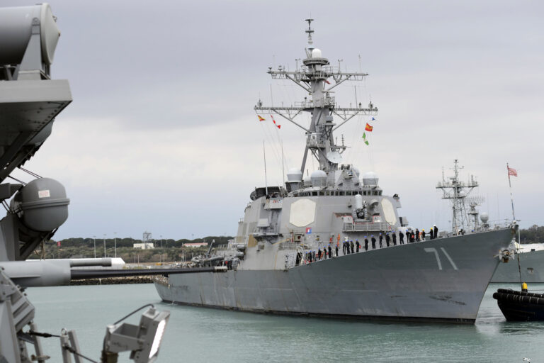 In this image provided by the U.S. Navy, sailors assigned to the Arleigh Burke-class guided-missile destroyer USS Ross (DDG 71) man the rails as the ship arrives at Naval Station Rota, Spain, on March 3, 2017.  (Mass Communication Specialist 3rd Class Ford Williams/U.S. Navy via AP) (AP)