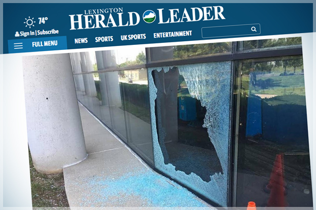 A shattered window at the Lexington Herald-Leader building. (Lexington Herald Leader/Screen Montage by Salon)