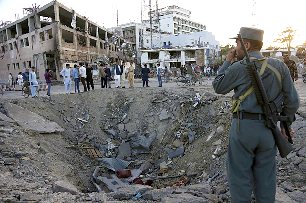 Crater created by massive explosion in Kabul, Afghanistan. (AP/Rahmat Gul)