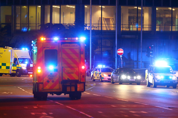 Emergency services arrive close to the Manchester Arena on May 23, 2017 in Manchester, England. (Getty/Dave Thompson)