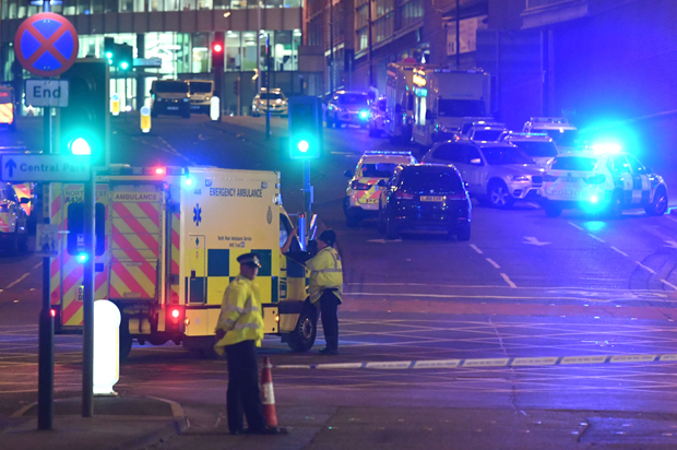 Emergency response vehicles arrive at the scene of an explosion during a concert by Ariana Grande in Manchester, May 23, 2017. (Getty/Paul Ellis)