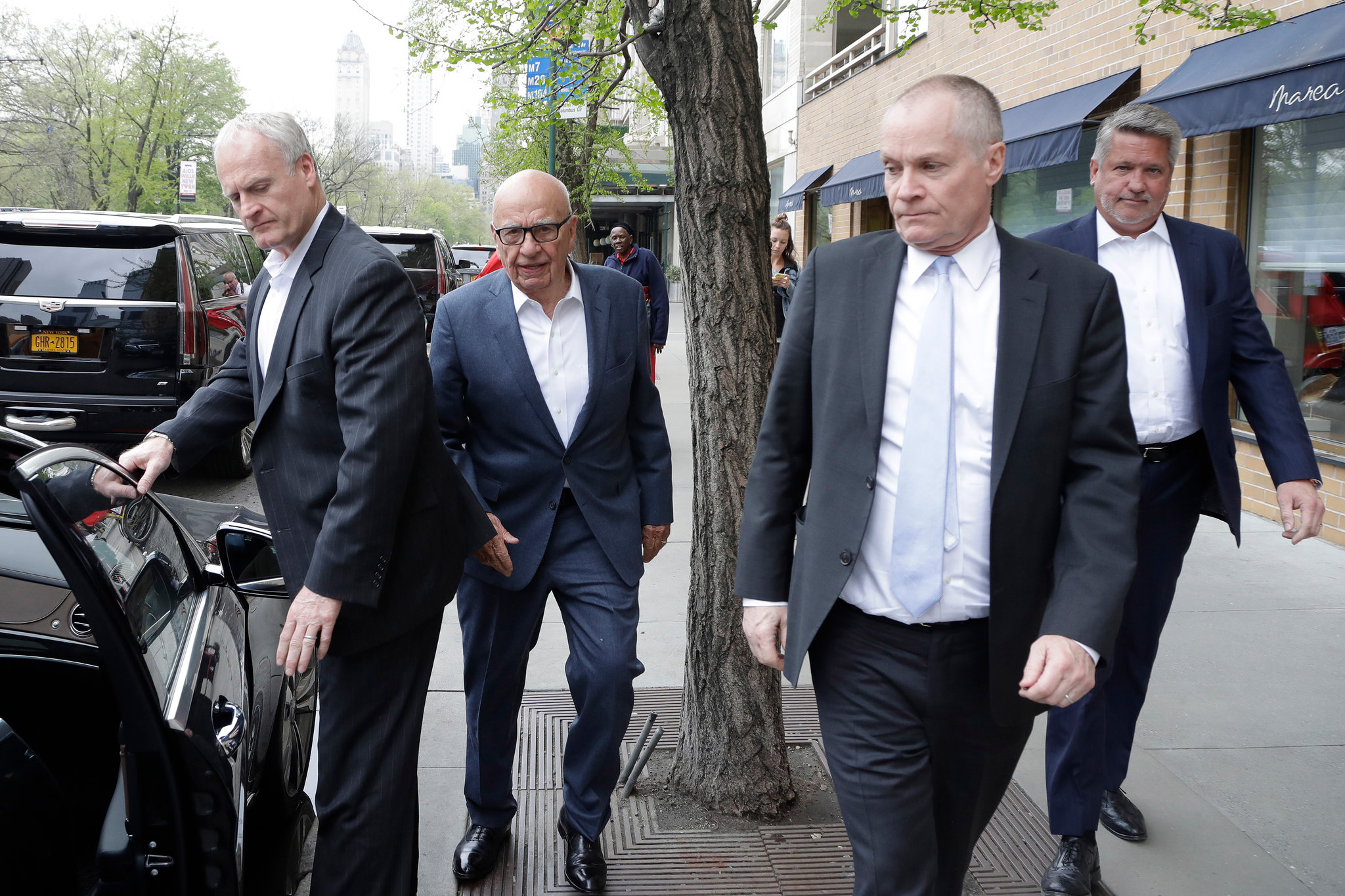 Rupert Murdoch, second from left, with Jack Abernethy, second from right, and Bill Shine, right, the co-presidents of Fox News, in New York, April 22, 2017. (Mark Lennihan/Associated Press)