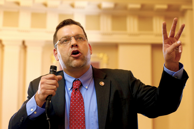 State Sen. Thomas Garrett, R-Buckingham, speaks during a debate on a bill that would deny in-state tuition to certain immigrants, during the Senate session at the Capitol in Richmond, Va., Tuesday, Jan. 20, 2015.  The bill failed to pass. (AP Photo/Steve Helber) (AP)