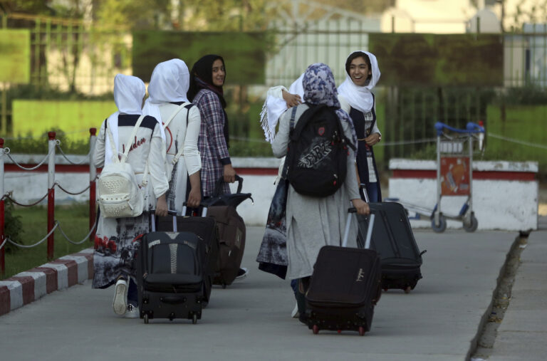 (AP Photos/Massoud Hossaini)
