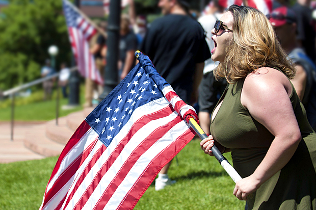 Right-wing protestors taunt anti-Trump and 'Antifa' protesters (Getty/Jason Connolly)