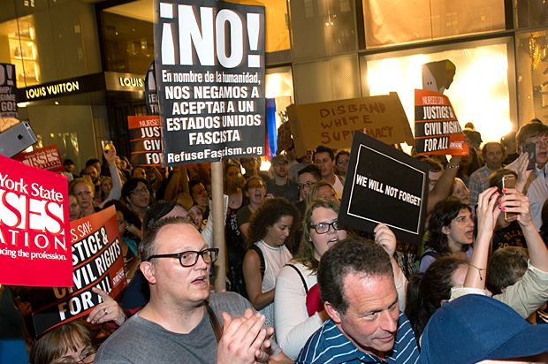 Michael Moore leads his Broadway audience to Trump Tower to protest Donald Trump (Getty/Noam Galai)